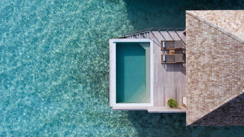 An Ocean Pool Villa at Hurawalhi Maldives seen from the air.