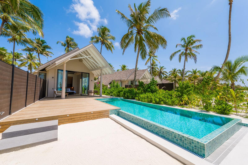 A Beach Pool Villa at ananea Madivaru Maldives, the private pool running out from the terrace under the palms