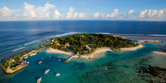 Holiday Inn Resort Kandooma Maldives from the air, the island and its lagoon in South Malé Atoll