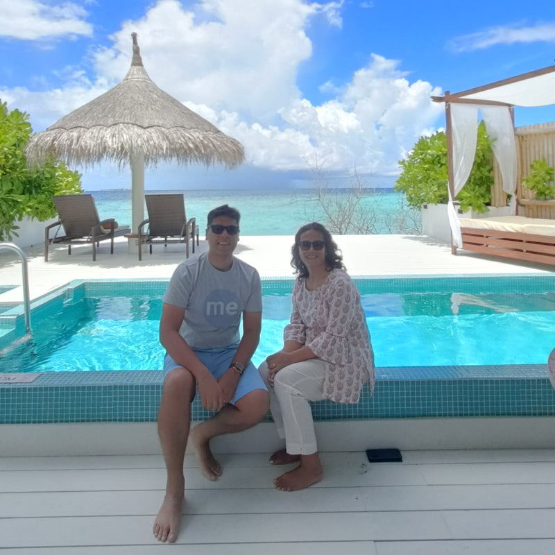 Pranjal and Amosha, by the pool in their accommodation at Malahini Kuda Bandos