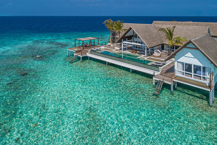 Luxury Maldives resort with overwater villas