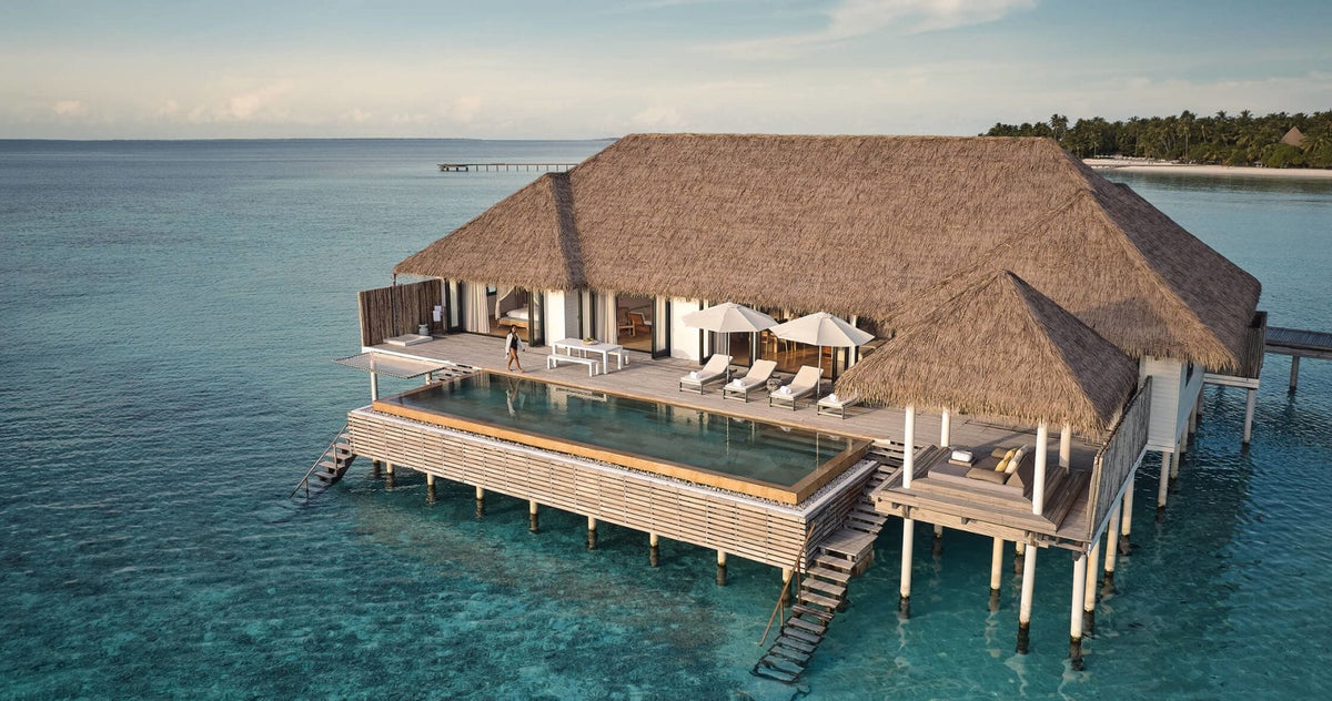 An overwater villa with a pool at COMO Maalifushi, Thaa Atoll