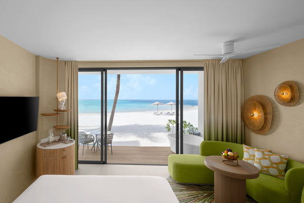 A Beachfront Room with Open-Air Bath at Centara Mirage Lagoon Maldives.