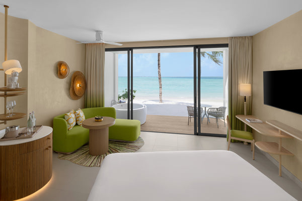 A Mirage Beachfront Room with Jacuzzi at Centara Mirage Lagoon Maldives.
