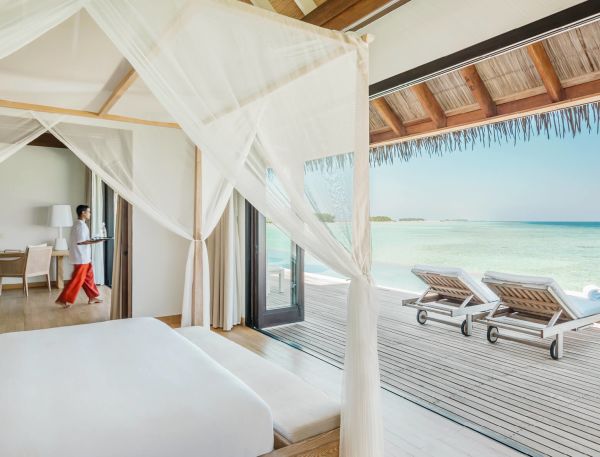 The bedroom of a Water Suite with Private Pool at COMO Maalifushi.
