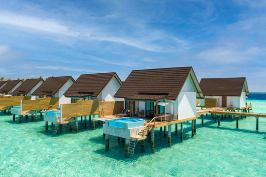 Fushifaru Maldives, Lhaviyani Atoll — aerial view of the island and its lagoon