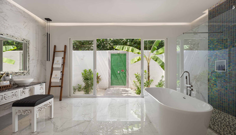A Beach Villa at Emerald Maldives Resort & Spa, photographed as a wide panorama.