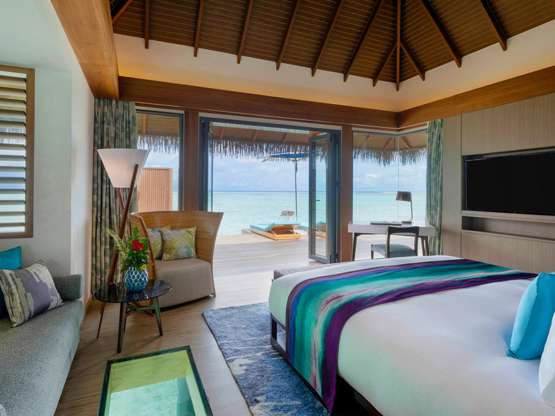 An Ocean Villa at Pullman Maldives Maamutaa, standing over the water