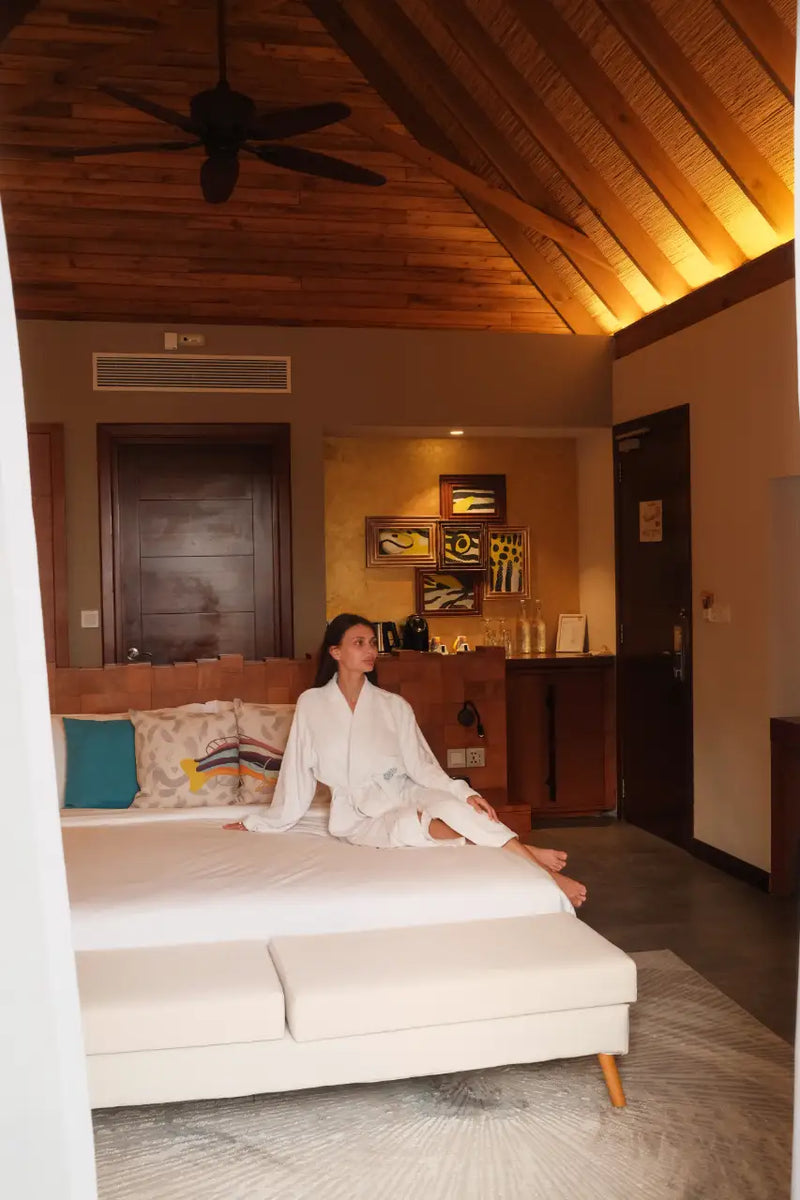 A Beach Villa Sunrise at Fushifaru Maldives.