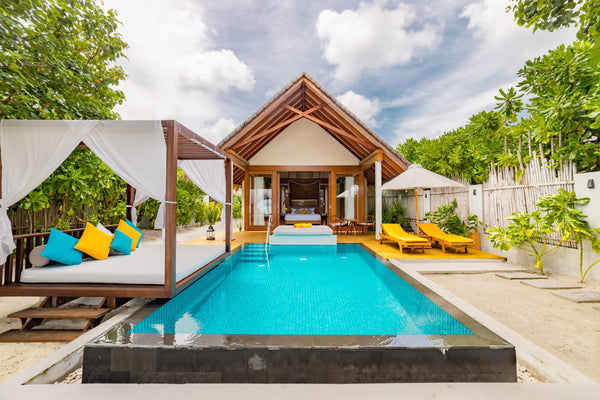 Beach Pool Villa at Furaveri with its long private pool and shaded terrace
