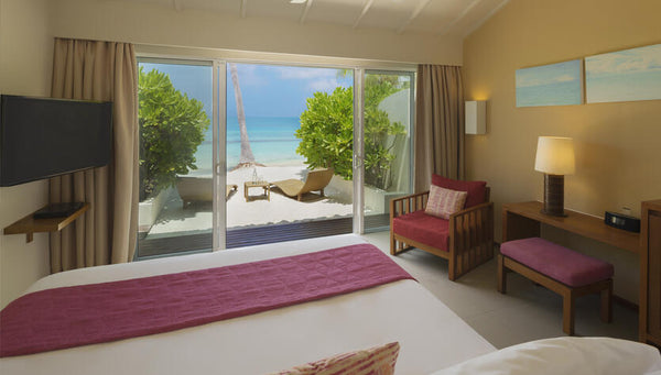 A Deluxe Ocean Front Beach Villa at Centara Ras Fushi Resort & Spa Maldives.