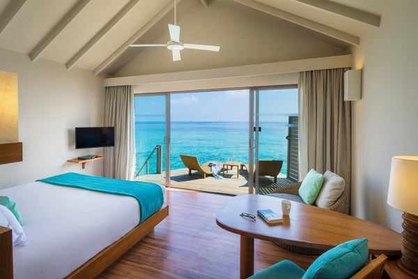 A Deluxe Water Villa at Centara Ras Fushi Resort & Spa Maldives.