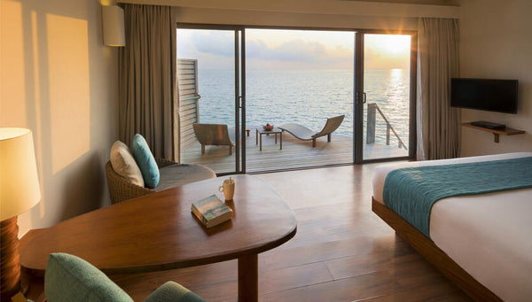 A Deluxe Sunset Water Villa at Centara Ras Fushi Resort & Spa Maldives.
