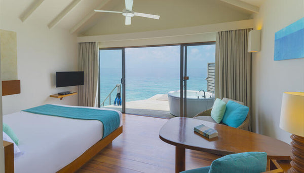 A Deluxe Spa Over Water Villa at Centara Ras Fushi Resort & Spa Maldives.