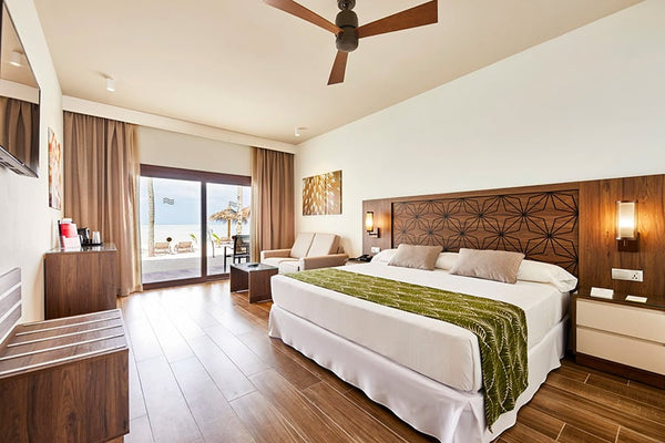 A double room with direct beach access at Hotel Riu Atoll.