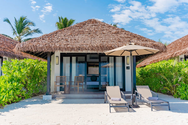 A beach villa with a pool at NOOE Maldives Kunaavashi.