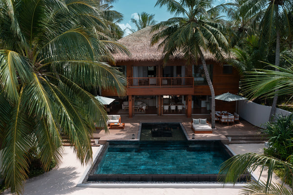 The Two Bedroom Beach House with Pool at Huvafen Fushi from the air.