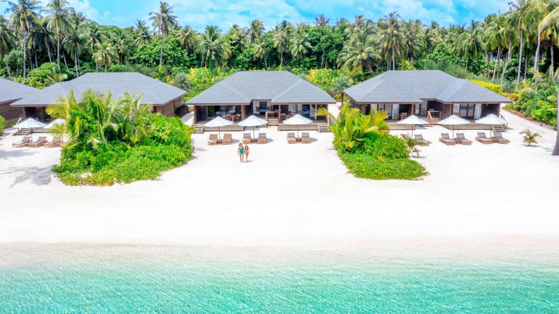 Jawakara Islands Maldives, Lhaviyani Atoll: beach villas set among greenery along the white sand shore