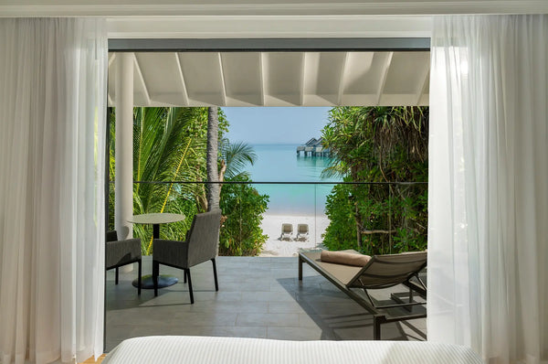 The view from the second bedroom of a Two Bedroom Beach House at Niva Kuramathi Maldives.