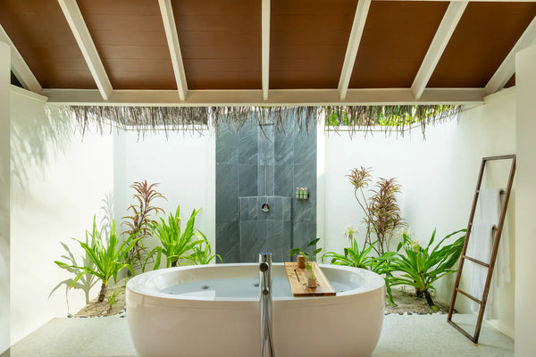 The bathroom in a Beach Villa at Kandolhu Maldives.