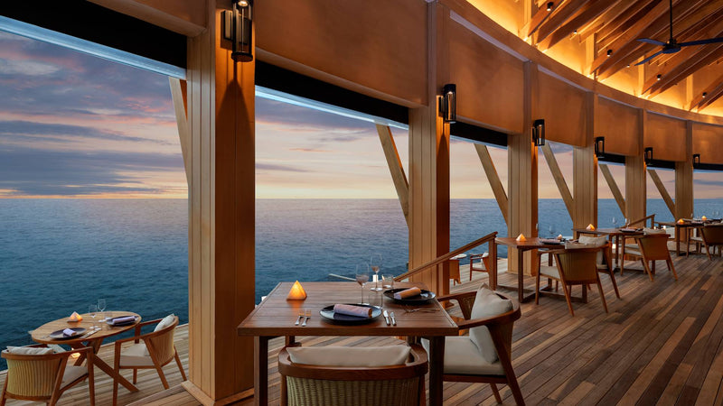 The dining area of Origin restaurant at Hilton Maldives Amingiri Resort & Spa.