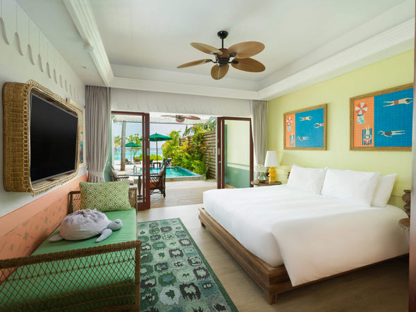 The bedroom of a Beach Room with Pool at SAii Lagoon Maldives.
