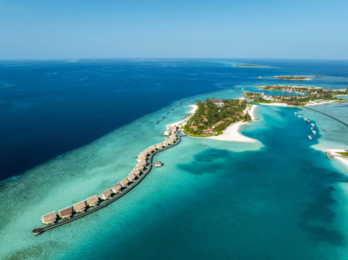 The overwater villa jetty at SAii Lagoon Maldives, over the lagoon.