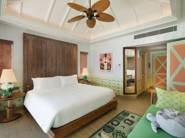 The bedroom of a Sky Room at SAii Lagoon Maldives.