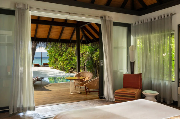 A Beach Villa with Pool at Niva Velassaru Maldives, looking from inside out.