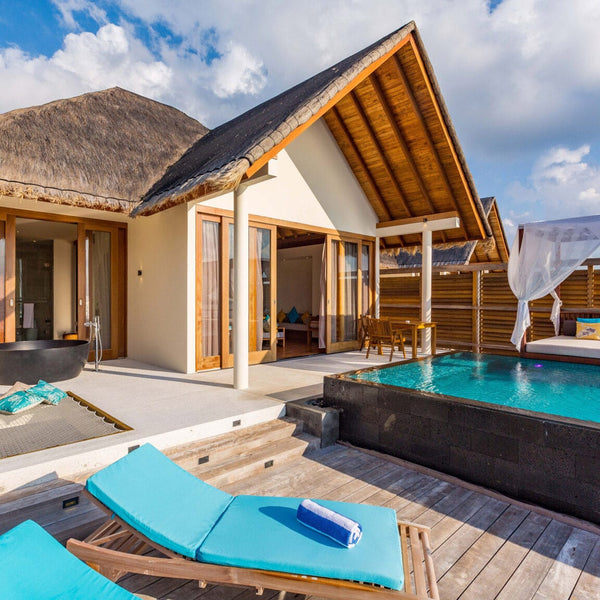Deck and private pool of an Ocean Pool Villa standing over the lagoon at Furaveri