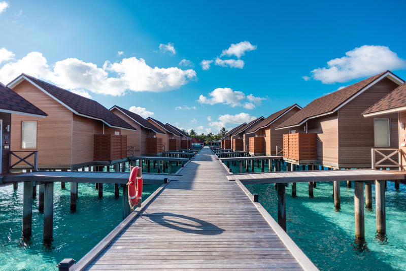A third view of a Pool Water Villa at Dhigufaru Island Resort.