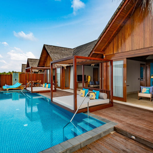 Deck and pool of a two-bedroom Reef Residence at Furaveri Maldives