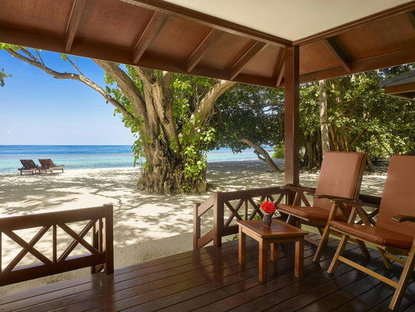 Veranda of a beach villa at Royal Island looking out to the beach and lagoon