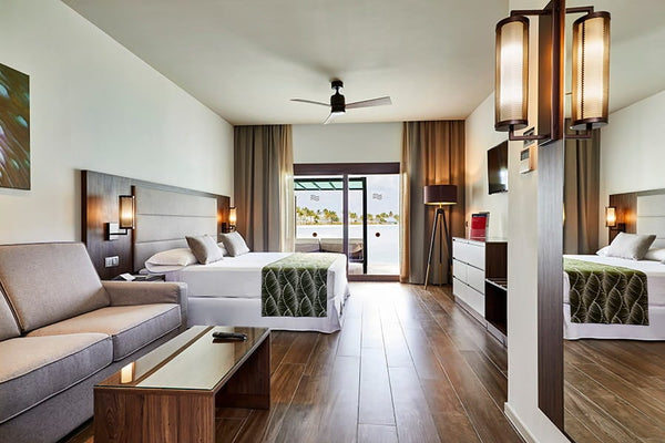 An overwater Junior Suite at Hotel Riu Atoll.