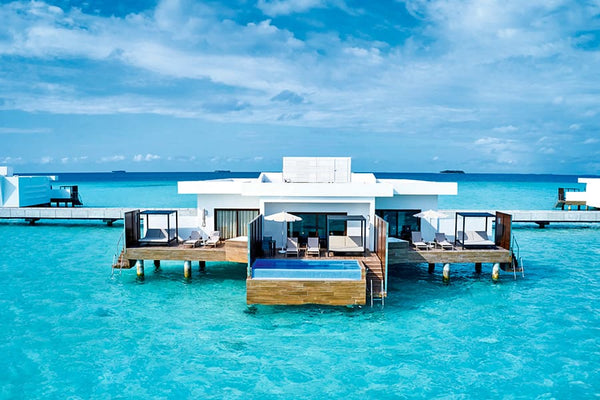 A Suite with private pool, over the water, at Hotel Riu Palace Maldivas.