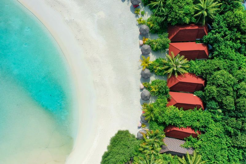 A Sunrise Beach Villa at Dhigufaru Island Resort.