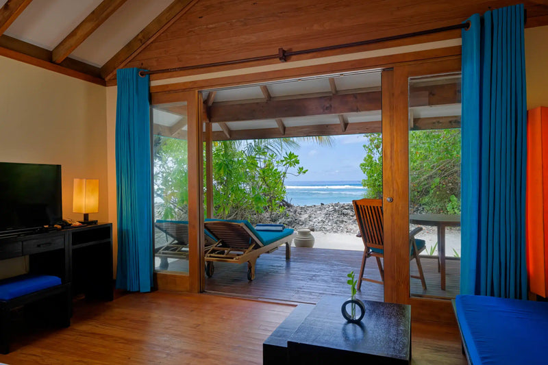 A Sunrise Villa at Canareef Resort Maldives opening onto the sand