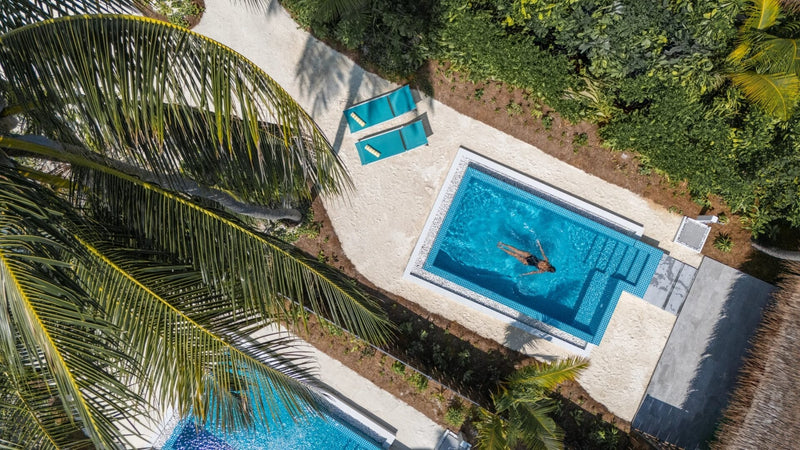 The Sunset Beach Villas with Pool at Nova Maldives seen from the air