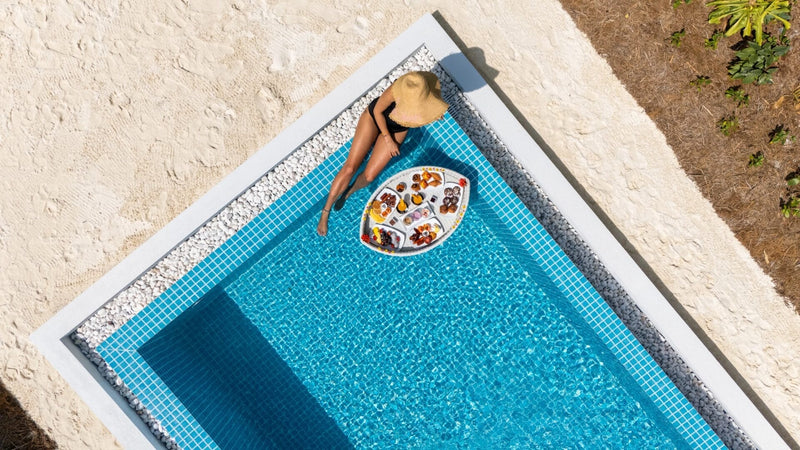 A floating breakfast in the pool of a Sunset Beach Villa with Pool at Nova Maldives