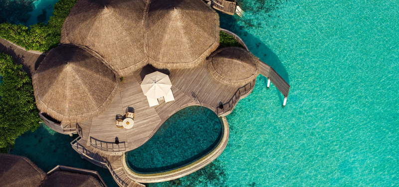An Ocean House with Private Pool at The Nautilus Maldives from the air.