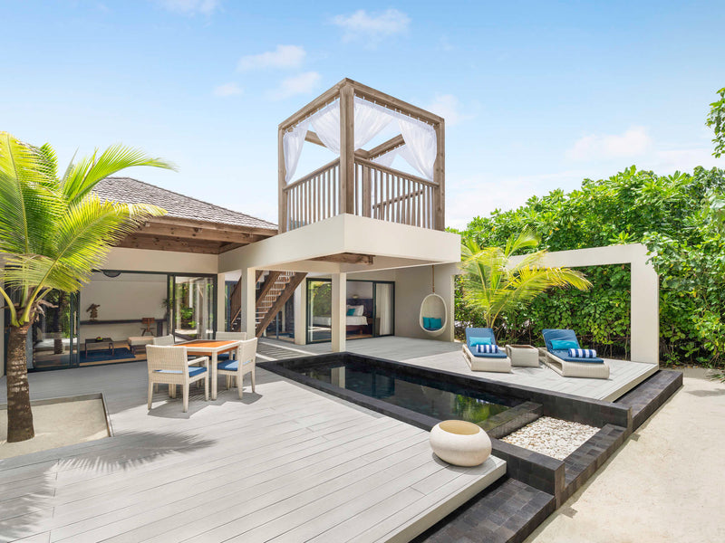 A Beach Pool Villa Sunset at Kuredhivaru Resort & Spa Maldives.