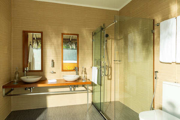 The bathroom of a Beach Bungalow at Niva Kuramathi Maldives.