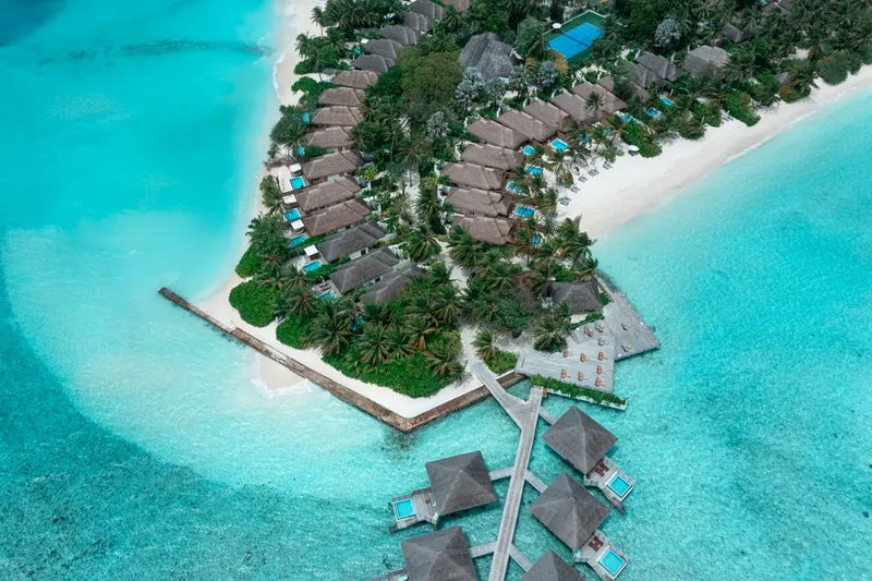 Another aerial view of Niva Velassaru Maldives and its lagoon.