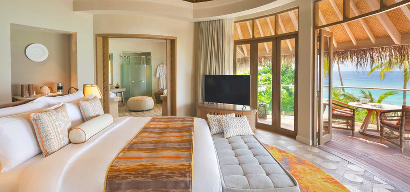 The bedroom of a Beach Residence with Private Pool at The Nautilus Maldives.