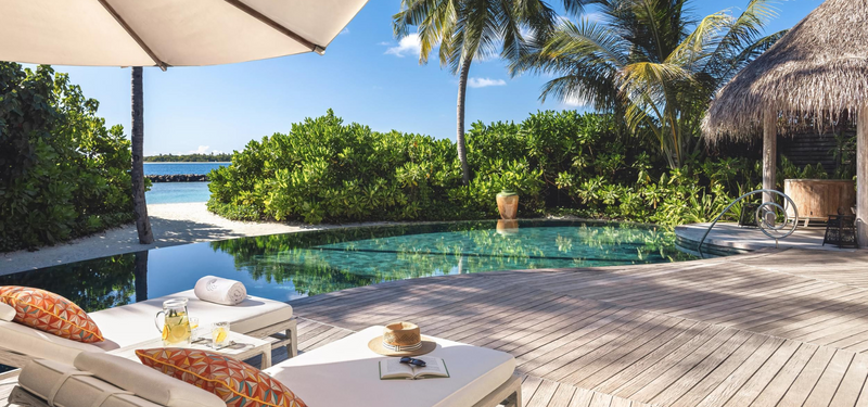 The pool deck of a Beach Residence with Private Pool at The Nautilus Maldives.