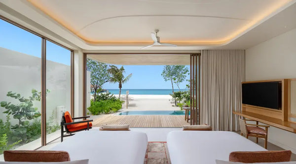 A Two-Bedroom Family Sunset Beach Pool Villa at Centara Grand Lagoon Maldives.