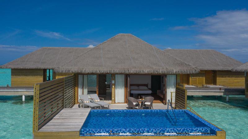 An overwater villa with a pool at Cocoon Maldives.