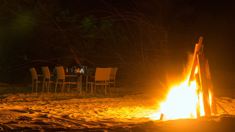 A fire on the beach at Cocoon Maldives.