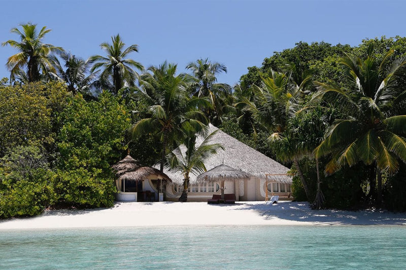 A Deluxe Beach Villa at Nika Island Resort & Spa.