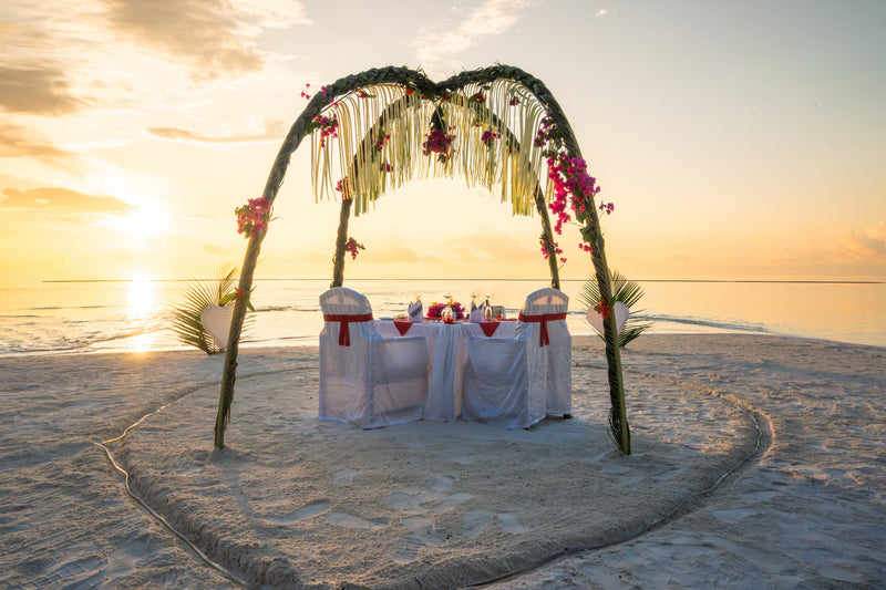 Another view of a beach dinner at Medhufushi Island Resort.